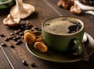 Mushroom coffee in green cup