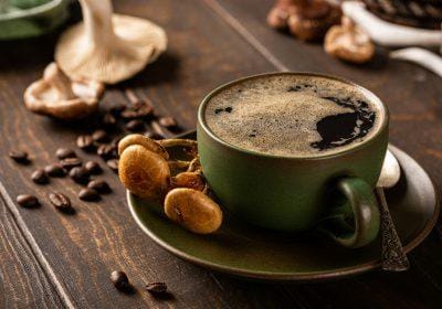 Mushroom coffee in green cup